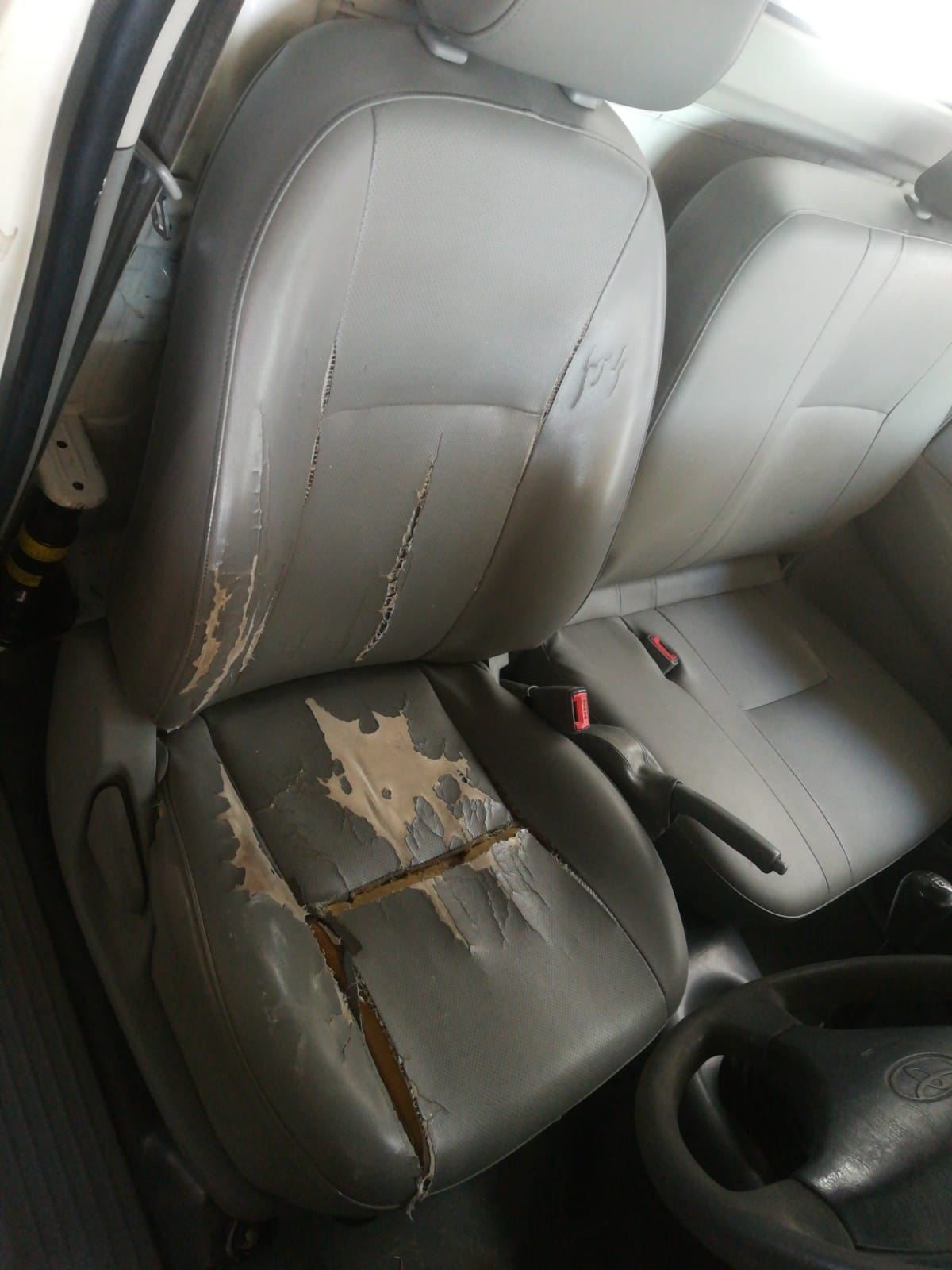 Worn Hilux seats before restoration