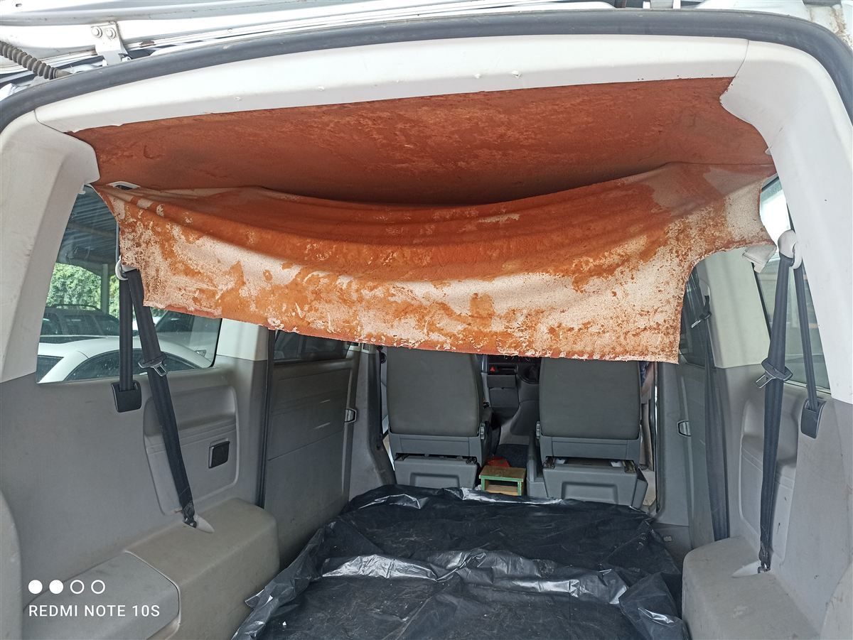 Vehicle roof lining before replacement