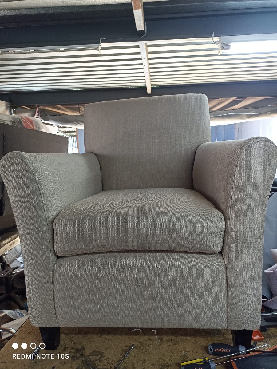 Sofa before upholstery restoration
