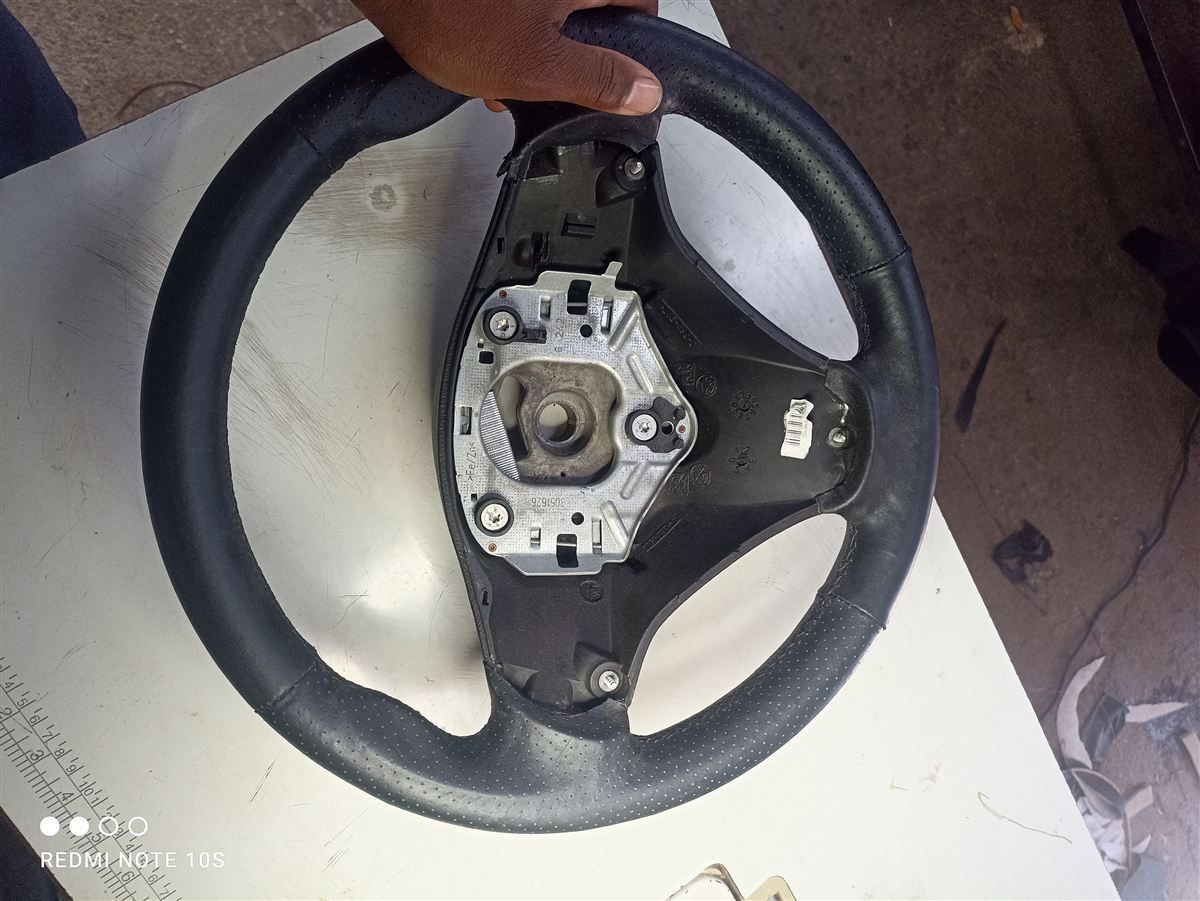 Steering wheel before retrimming